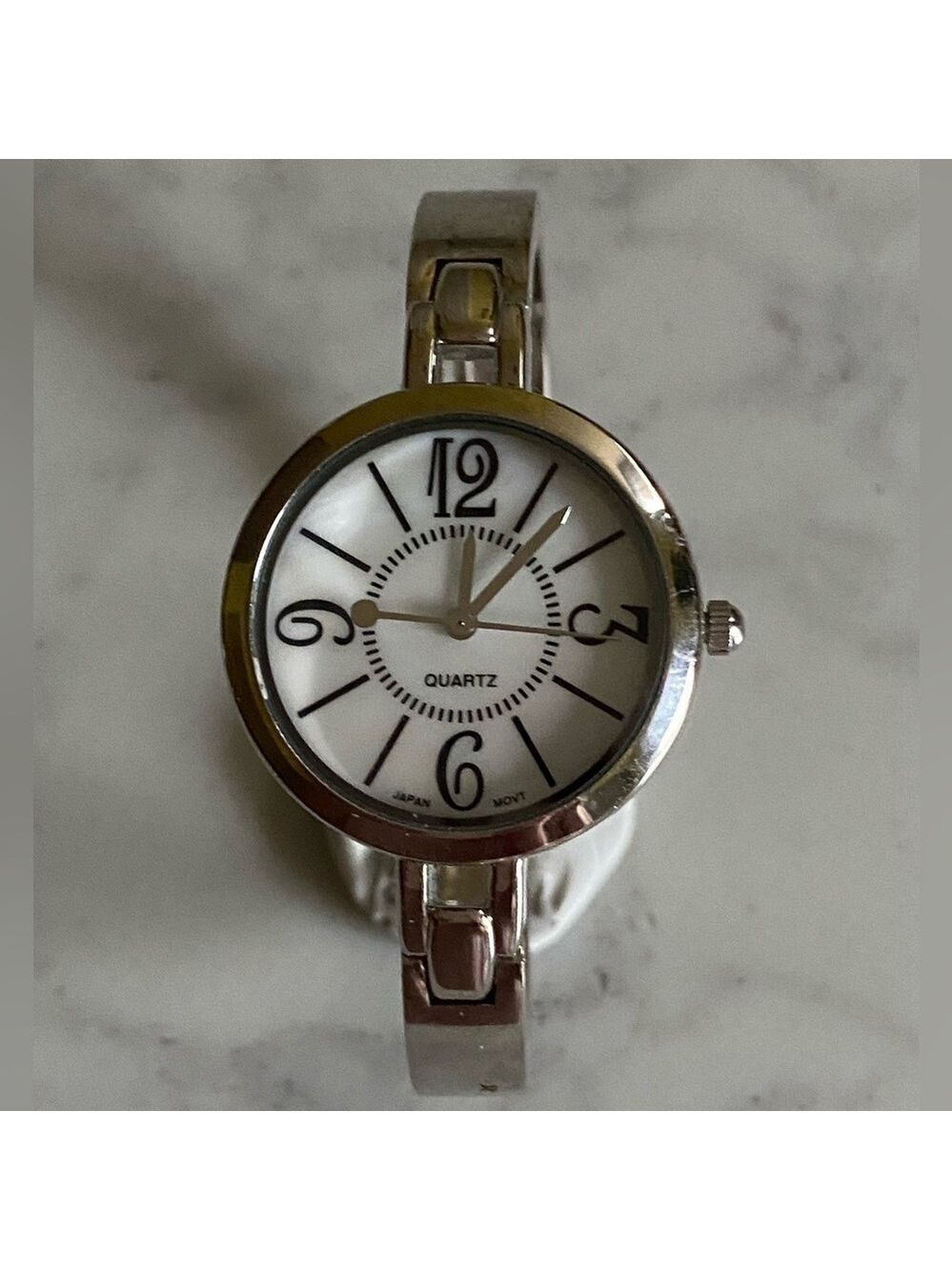 Avon Silver-tone Contemporary Classic Cuff Watch with Large Numbers